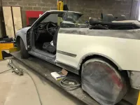 AUDI A4 CABRIOLET Réparation, changement d'aile arrière gauche , puis préparation complète pour changement de couleur en blanc opaque audi (38)